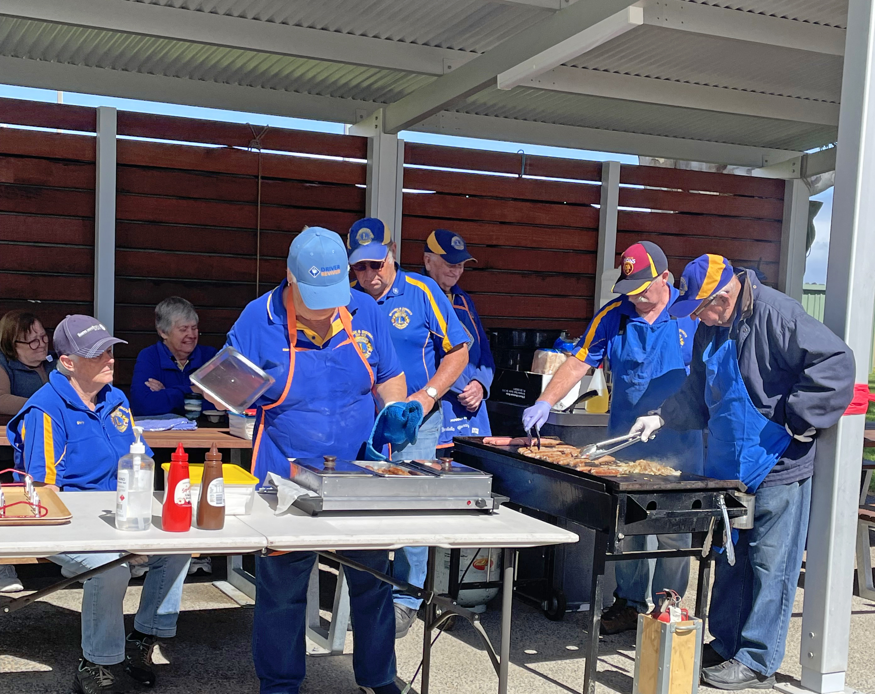 Meningie Lions club cooking sausage sizzle 2024