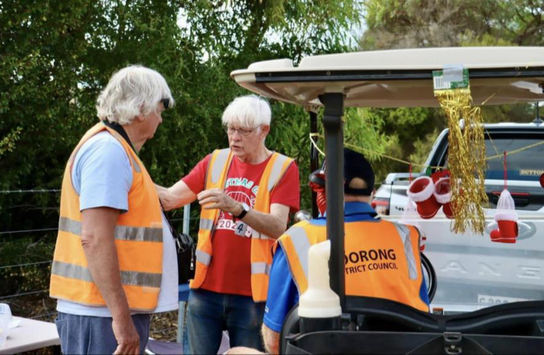 Left to right - Cr Brenton Qualmann receiving instructions from Don Green at Tailem Bend Christmas Pageant